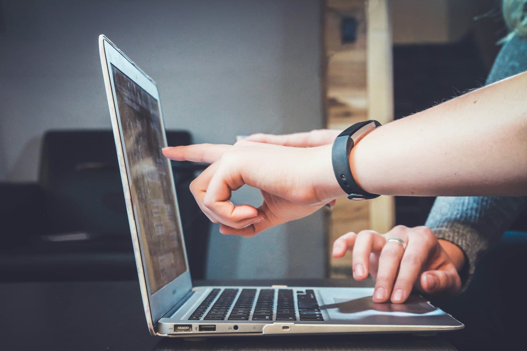 A designer reviewing a digital product interface
